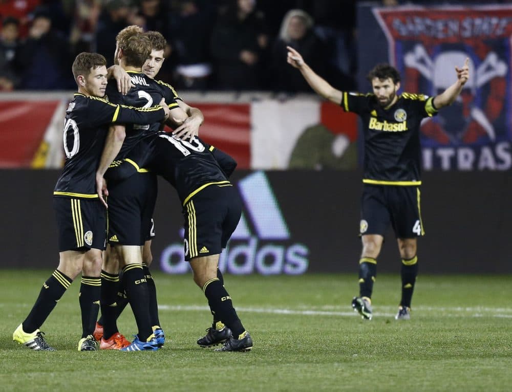 HARRISON, NJ - NOVEMBER 29:  Members of the Columbus Crew celebrate their Eastern Conference win over the New York Red Bulls  after their match at Red Bull Arena on November 29, 2015 in Harrison, New Jersey.  (Photo by Jeff Zelevansky/Getty Images)