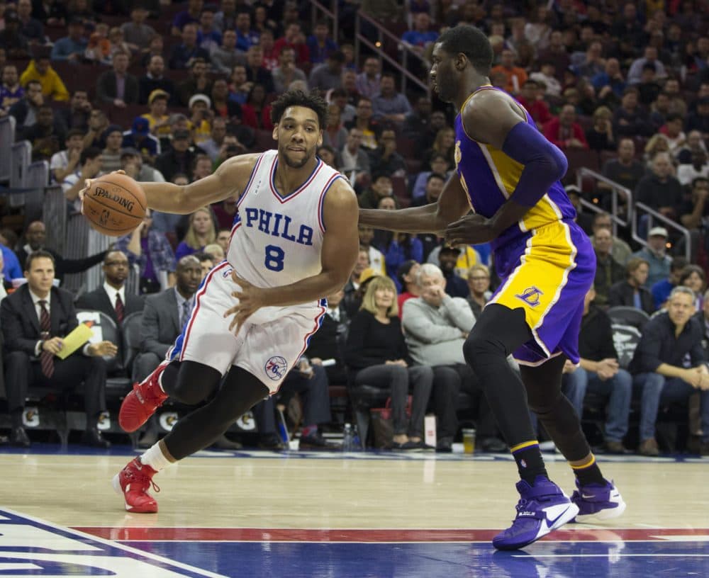 PHILADELPHIA, PA - DECEMBER 1: Jahlil Okafor #8 of the Philadelphia 76ers dribbles the ball with Roy Hibbert #17 of the Los Angeles Lakers defending on December 1, 2015 at the Wells Fargo Center in Philadelphia, Pennsylvania. NOTE TO USER: User expressly acknowledges and agrees that, by downloading and or using this photograph, User is consenting to the terms and conditions of the Getty Images License Agreement. The 76ers defeated the Lakers 103-91. (Photo by Mitchell Leff/Getty Images)