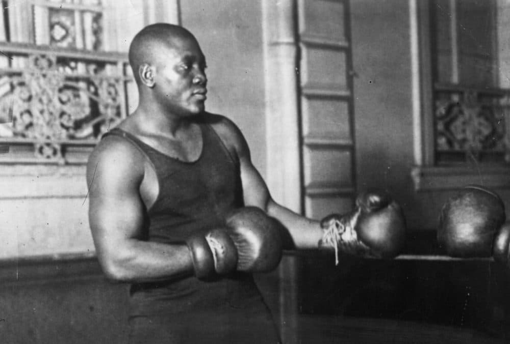 Jack Johnson (1878 - 1946) was one of the greatest yet most unpopular Heavyweight boxers of all time. In 1908 he took the world title from Tommy Burns and held on to it until Jess Willard beat him in 1915. (Topical Press Agency/Getty Images)