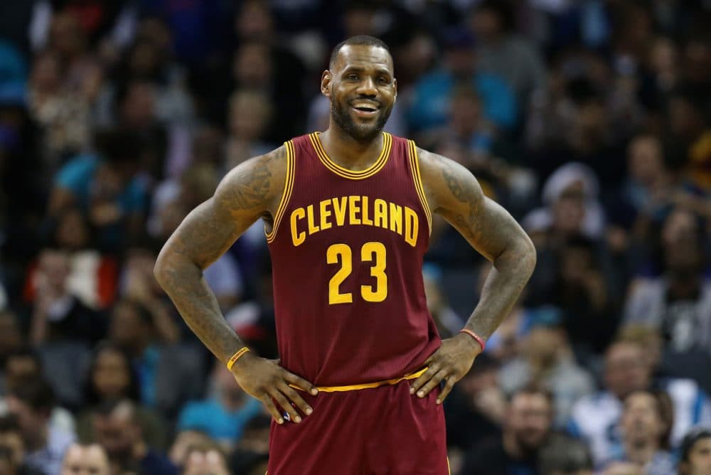 LeBron James of the Cleveland Cavaliers reacts during their game against the Charlotte Hornets at Time Warner Cable Arena on November 27, 2015 in Charlotte, North Carolina.  James just signed a lifetime deal with Nike and it's reportedly the largest single athlete guarantee in the company's history. (Streeter Lecka/Getty Images)