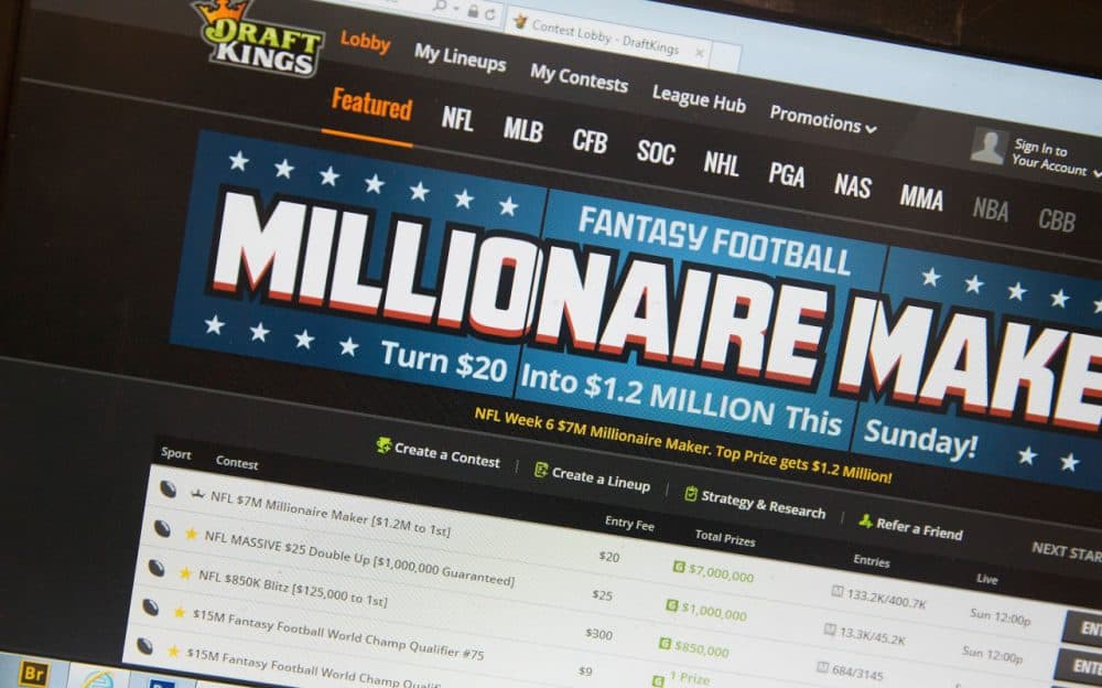 The fantasy sports website DraftKings is shown on October 16, 2015 in Chicago, Illinois. DraftKings and its rival FanDuel have been under scrutiny after accusations surfaced of employees participating in the contests with insider information. An employee recently finished second in a contest on FanDuel, winning $350,000. Nevada recently banned the sites.  (Photo illustration by Scott Olson/Getty Images)