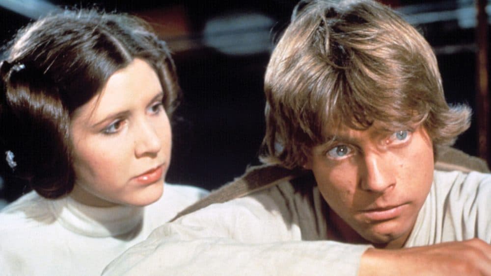 Carrie Fisher (left) and Mark Hamill as Princess Leia and Luke Skywalker in the original 1977 “Star Wars,” later renamed “Star Wars: Episode IV – A New Hope.” (Vernon Area Public Library/Flickr)