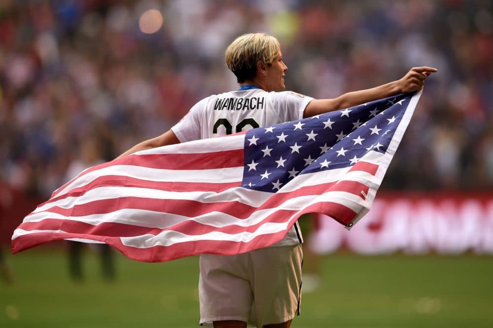 Abby Wambach celebrates the U.S. national team's 5-2 victory against Japan in the FIFA Women's World Cup on July 5 in Vancouver, Canada. Wambach will retire from professional soccer after one final game tonight. (Dennis Grombkowski/Getty Images)