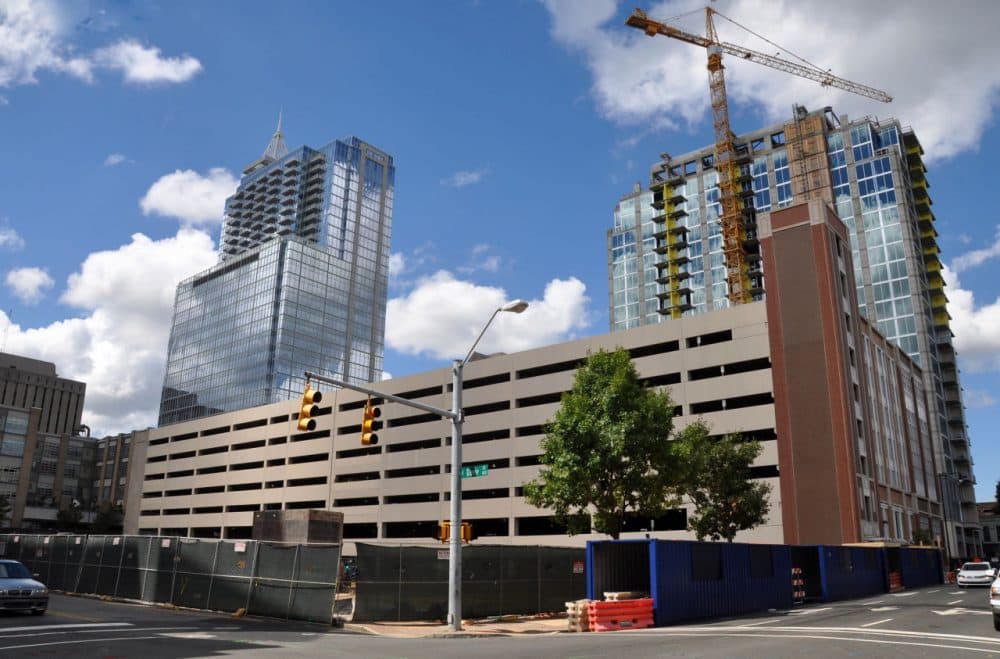 In downtown Raleigh, mixed use construction is on the rise.  Economist Mike Walden of North Carolina State University sees the rise in interest rates as a positive referendum on the economy. (bz3rk/Flickr)