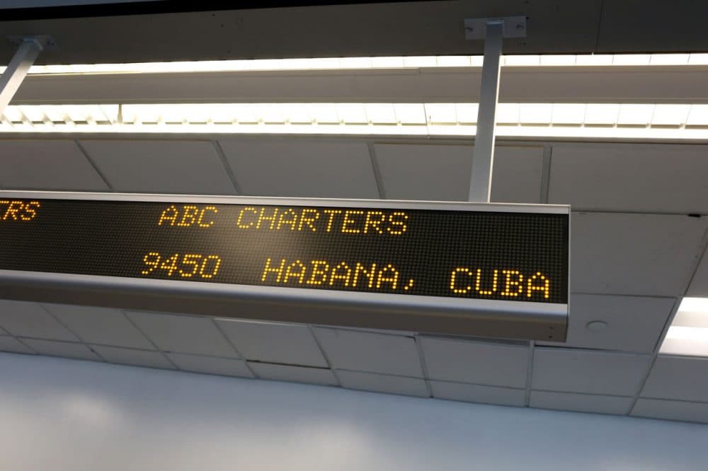 A sign indicates the ABC Charters American Airlines flight to Havana, Cuba at Miami International Airport on December 19, 2014 in Miami, Florida. The U.S. and Cuba have reached an agreement to allow commercial flights between the two countries. (Joe Raedle/Getty Images)