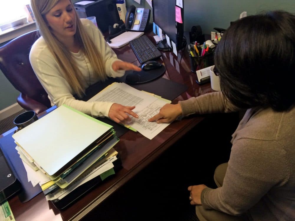 MaryLou, right, meets with lawyer Erin Witte in Fairfax City, Va. (Michael Pope/WAMU)