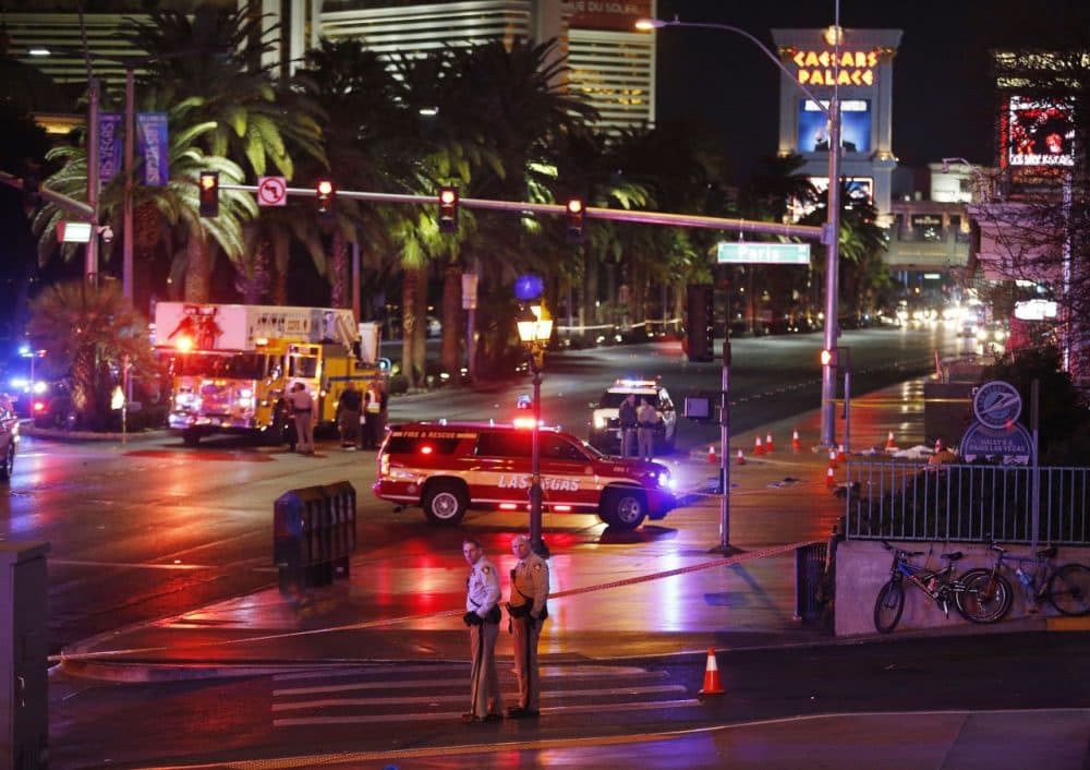 Police and emergency crews respond to the scene of a car accident along Las Vegas Boulevard on Sunday, Dec. 20, 2015. (John Locher/AP)
