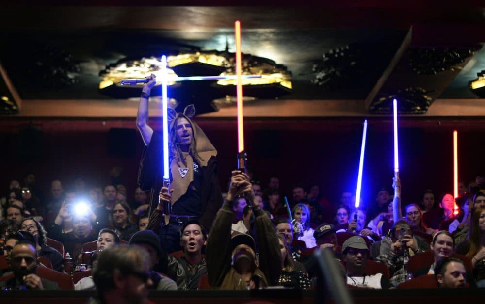 Fans attend the opening night of Walt Disney Pictures and Lucasfilm's 'Star Wars: The Force Awakens' at TCL Chinese Theatre IMAX in Hollywood, California. (Kevork Djansezian/Getty Images)