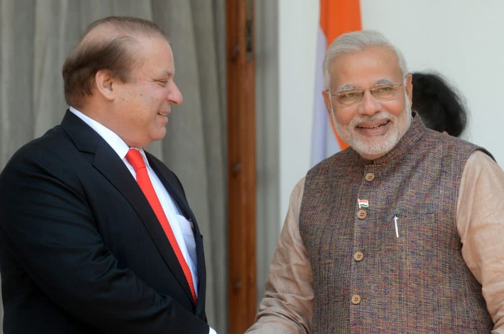 India's newly sworn-in Prime Minister Narendra Modi (R) talks with Pakistani Prime Minister Nawaz Sharif during a meeting in New Delhi on May 27, 2014. The two met again today, this time in Pakistan. (Raveendran/AFP/Getty Images)