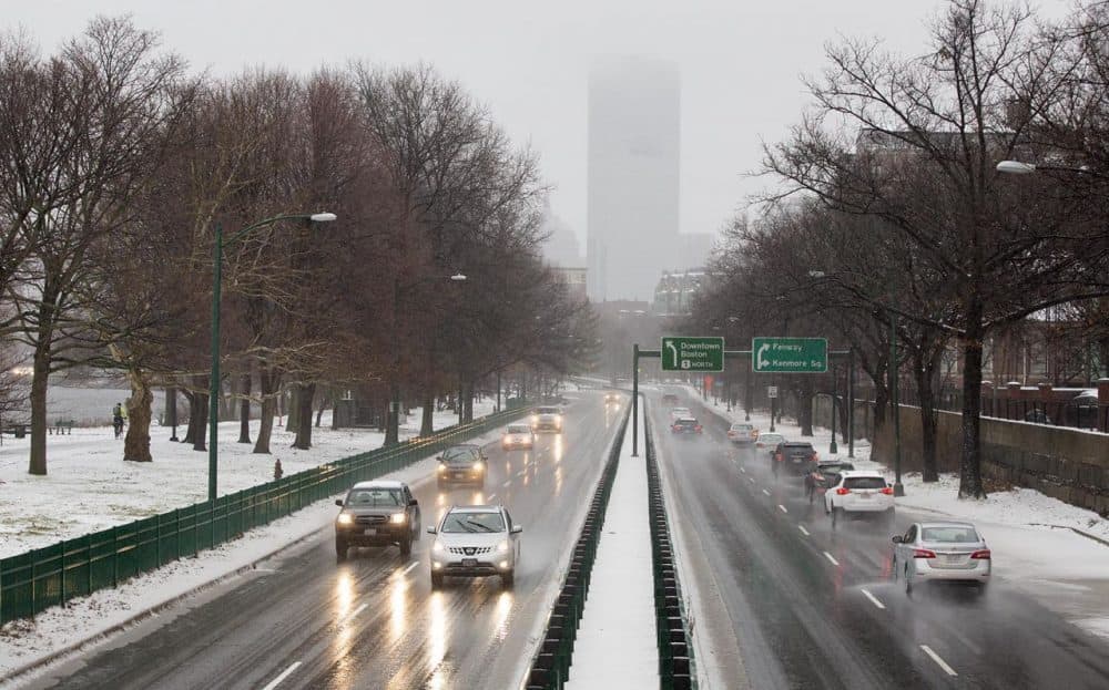 Storrow Drive on Tuesday morning as the snow from Boston's first storm of the season began to turn to sleet and rain. (Robin Lubbock/WBUR)