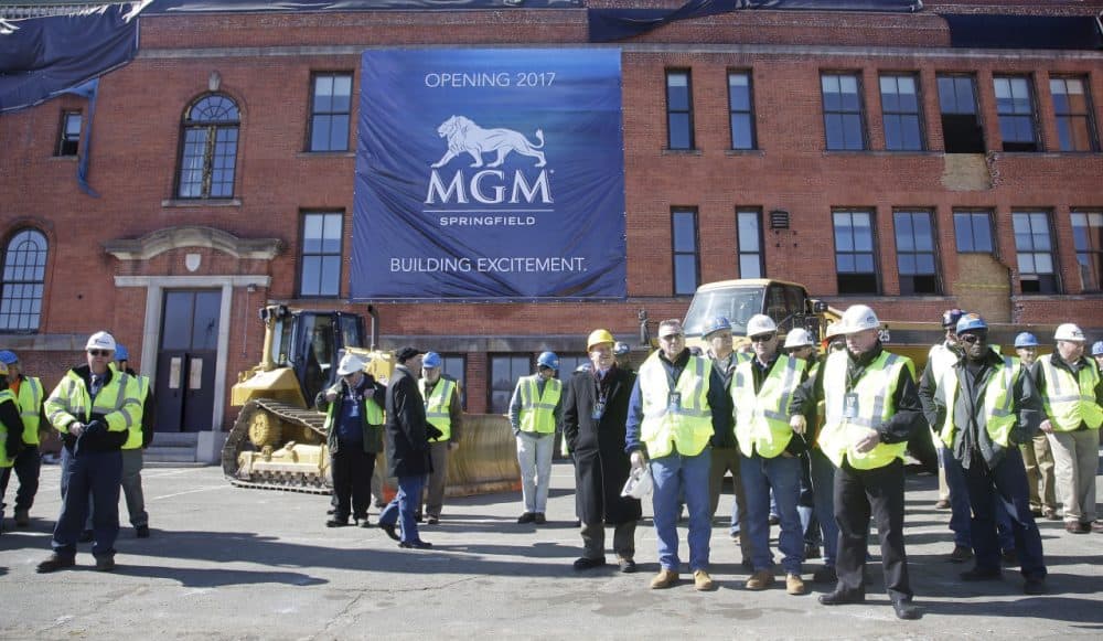 Constructions workers gathered to watch a ground breaking ceremony for the MGM casino in Springfield earlier this year. (Stephan Savoia/AP)