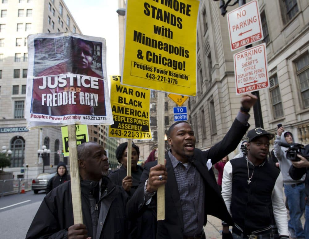 On Wednesday, the trial of the first of six Baltimore police officers charged in the death of Freddie Gray last spring ended in a hung jury. (Jose Luis Magana/AP)