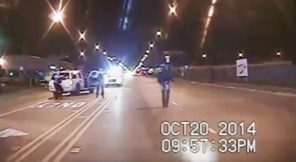 The authors: &quot;It is almost unavoidable to watch a video of a white police officer shooting a black youth but through the lens of our own experiences and backgrounds.&quot; Pictured: In this Oct. 20, 2014 frame from dash-cam video provided by the Chicago Police Department, Laquan McDonald, right, walks down the street moments before being shot 16 times by officer Jason Van Dyke in Chicago. (Chicago Police Department via AP)
