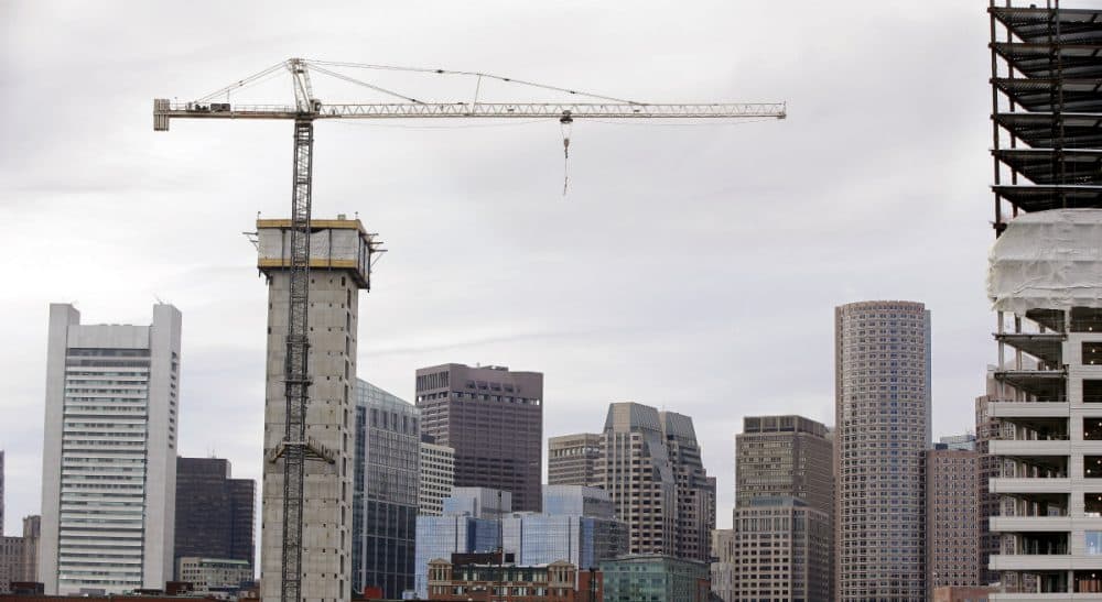 Mike Broida: &quot;A city is only as vibrant as its population is diverse.&quot; 
Pictured: Several commercial construction projects in the Seaport district of Boston as seen against the backdrop of the city's skyline. (Stephan Savoia/AP)