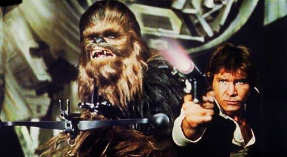 Peter Mayhew as Chewbacca, left, and Harrison Ford as Han Solo in the original 1977 &quot;Star Wars: Episode IV - A New Hope&quot; film. The new film, &quot;Star Wars: The Force Awakens,&quot; opens in U.S. theaters on Dec. 18, 2015. (AP/Twentieth Century Fox Home Entertainment)