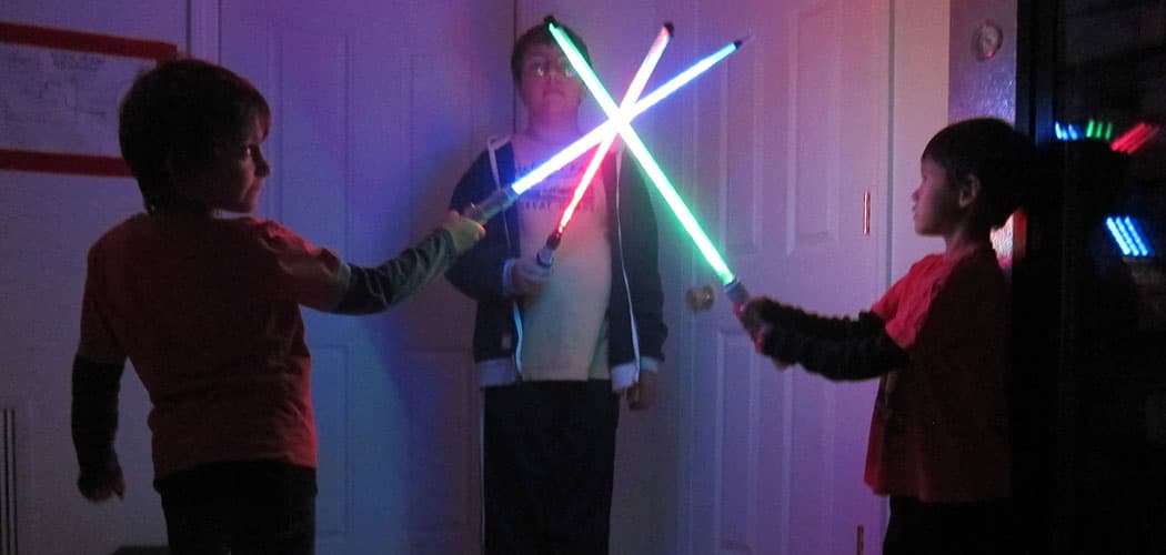 Trying out the (play) weapons made at a previous “Lightsaber Build Party” at Somerville's Parts and Crafts. (Courtesy of Parts and Crafts)