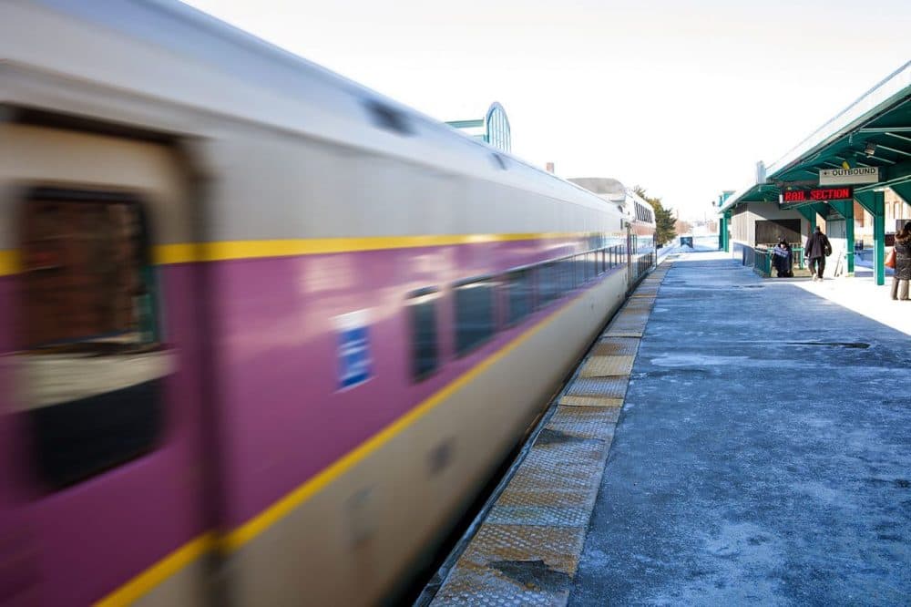 A northbound MBTA commuter rail train leaves Lynn. Proposed fare hikes would effect commuter rail, buses, and T costs for passengers. (Jesse Costa/WBUR)