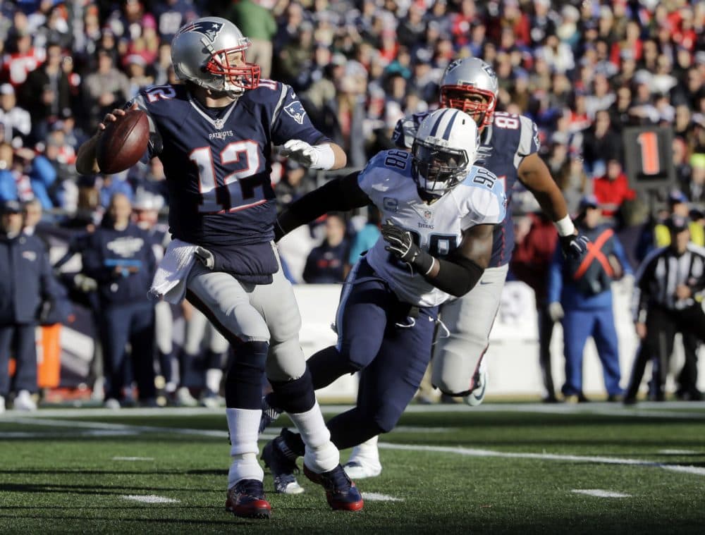 New England Patriots quarterback Tom Brady (12) passes against pressure from Tennessee Titans linebacker Brian Orakpo (98) in Foxborough, Mass. (Steven Senne/AP)