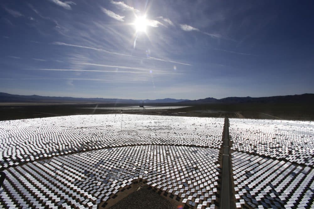 As the price of solar energy goes down, more large corporations are investing in renewable energy like solar. Pictured here is the world's largest solar-thermal power plant project, located near the California-Nevada border. (AP Photo/Chris Carlson)