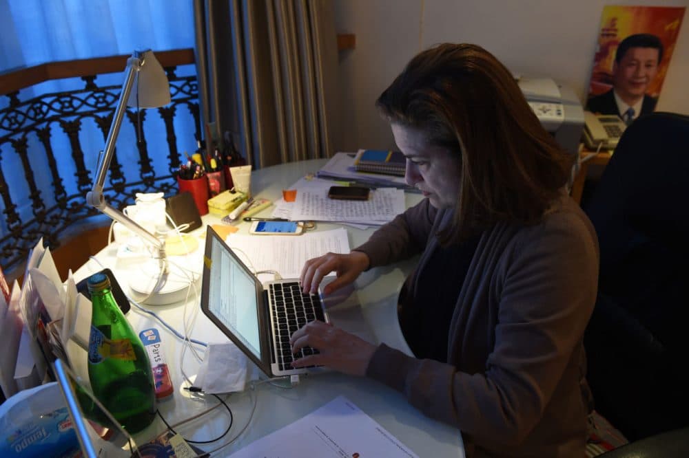 Ursula Gauthier, the Beijing-based correspondent for French news magazine L'Obs, works at her desk in her apartment in Beijing on December 26, 2015.  China confirmed the imminent expulsion of Gauthier in the first such case since 2012, accusing her of &quot;flagrantly championing&quot; terrorist acts in a statement on its foreign ministry's website on December 26. (Greg Baker/AFP/Getty Images)