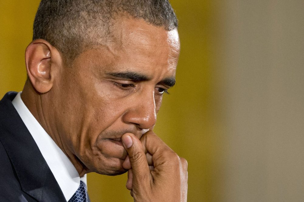 An emotional President Barack Obama pauses as he speaks about the youngest victims of the Sandy Hook shootings. (Jacquelyn Martin/AP)