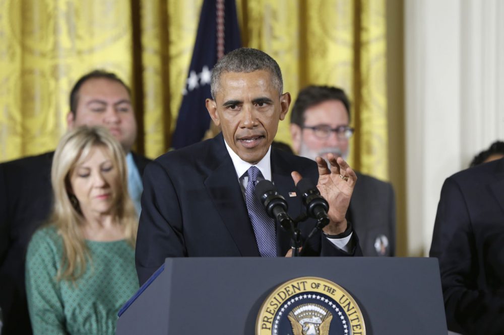 President Barack Obama, joined by gun violence victims, speaks in the East Room of the White House in Washington, Tuesday, Jan. 5, 2016, about steps his administration is taking to reduce gun violence. Also on stage are stakeholders, and individuals whose lives have been impacted by the gun violence. (Carolyn Kaster/AP)