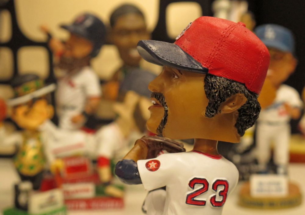 Luis Tiant has an honored place among the bobblehead collection at Only A Game. (Karen Given/Only A Game)