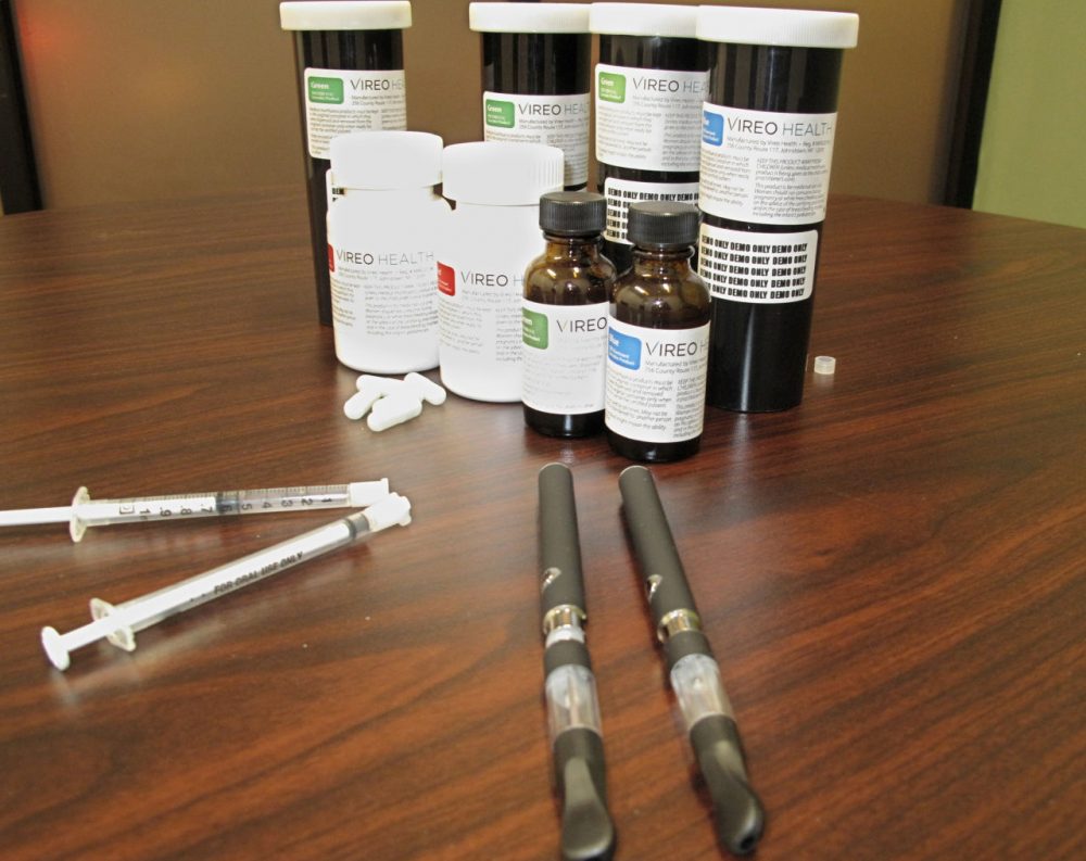 Packaging for medical marijuana is displayed at Vireo Health of New York, a dispensary in White Plains, N.Y., on Jan. 5, 2016. The product is scheduled to be made available in New York beginning Thursday, Jan. 7. New York is the only state besides Minnesota to limit medical marijuana to non-smokeable extracts delivered in forms such as capsules, vaporizers and liquids taken orally, and its one of few states with a physician training requirement. New York limited its program to 20 dispensaries, each offering up to five brands, and a shorter list of qualified conditions than some other states allow. (Jennifer Peltz/AP)