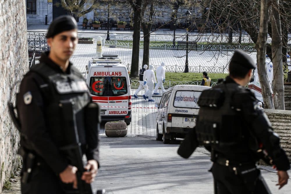 Turkish police stand guard next to ambulances as they block access to the Blue Mosque area after a blast in Istanbul's tourist hub of Sultanahmet on January 12, 2016. At least 10 people were killed and 15 wounded in a suspected terrorist attack in the main tourist hub of Turkey's largest city Istanbul, officials said. A powerful blast rocked the Sultanahmet neighbourhood which is home to Istanbul's biggest concentration of monuments and and is visited by tens of thousands of tourists every day. (Bulent Kilic/AFP/Getty Images)