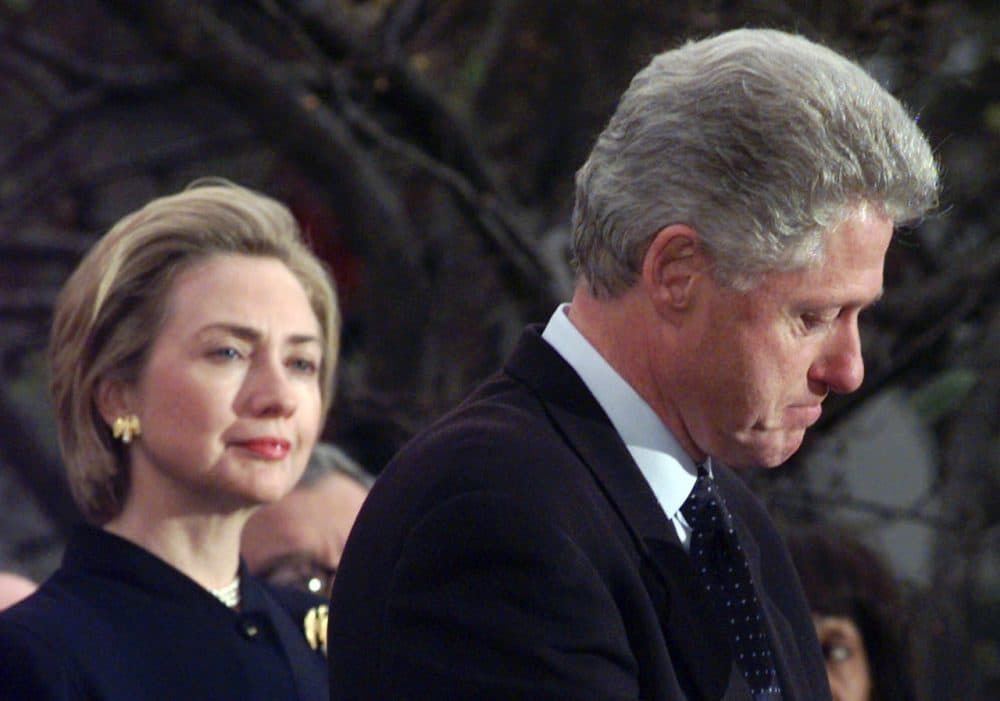 First lady Hillary Rodham Clinton watches President Clinton pause as he thanks those Democratic members of the House of Representatives who voted against impeachment in this Dec. 19, 1998 photo. Her husband's dalliances with Monica Lewinsky left Americans baffled, and at the same time admiring that Hillary would stand by her husband. &quot;The most difficult decisions I have made in my life were to stay married to Bill, and to run for the Senate from New York,&quot; she said. She decided she wanted the marriage to last, if that was possible. (Susan Walsh/AP)