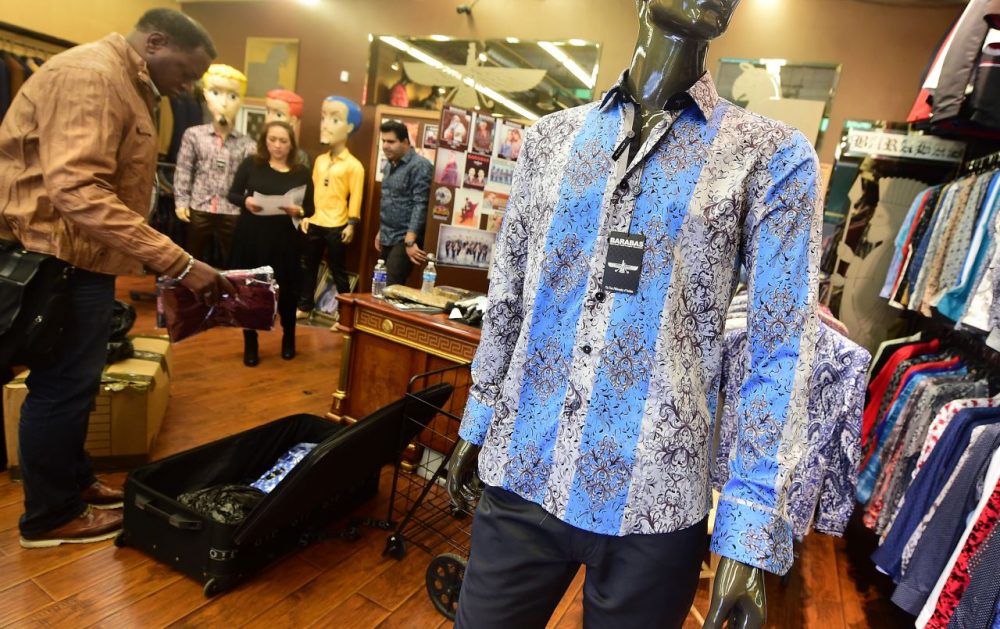 A shirt known as &quot;Fantasy,&quot; a replica of the shirt worn by Mexican drug-lord Joaquin 'El Chapo' Guzman is prominently displayed for sale at Barabas, a retail shop in the city's Fashion District in Los Angeles, California on January 13, 2016.
No one would have called Mexican drug lord Joaquin &quot;El Chapo&quot; Guzman a fashion icon when photos of his arrest last week showed the recaptured capo in a smeared, dirty undershirt.
But one Los Angeles retailer is cashing in on an altogether more dapper depiction of the kingpin, in a newly iconic snapshot with Sean Penn. (Frederic J. Brown/AFP/Getty Images)