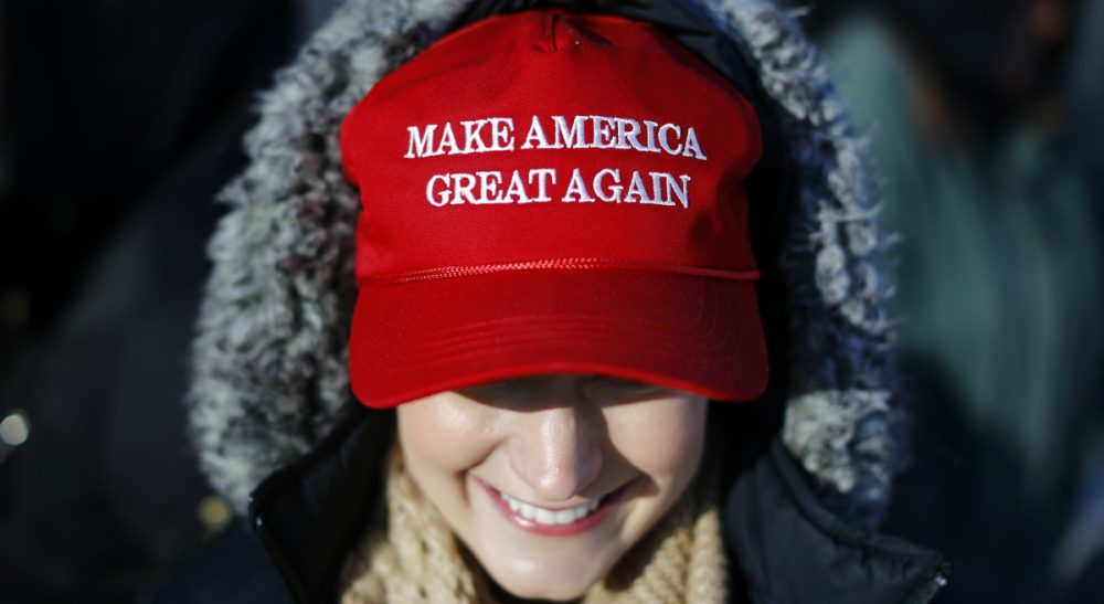 Picking apart Donald Trump's trademark slogan, which -- as it turns out -- was also used by Ronald Reagan at one point. In this photo, a Trump supporter waits in line to attend a rally featuring the Republican presidential candidate at the Surf Ballroom in Clear Lake, Iowa, Saturday, Jan. 9, 2016. (Patrick Semansky/ AP)
