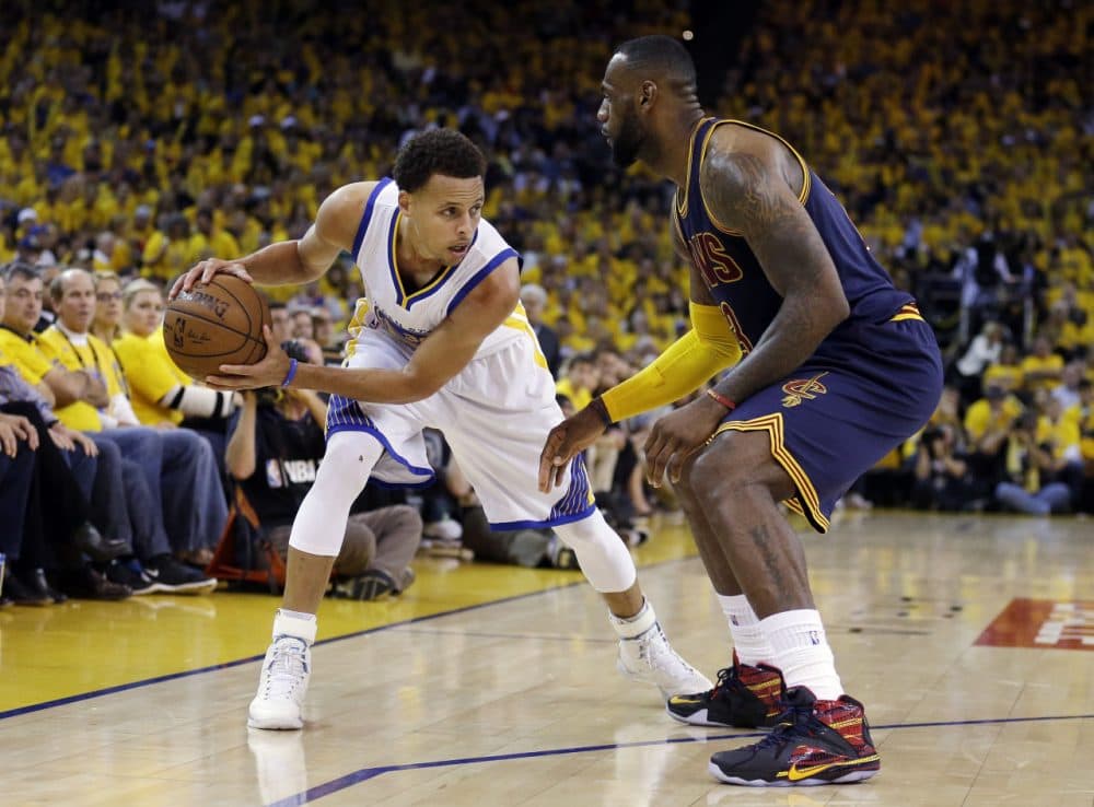 Last June, Stephen Curry (left) overtook LeBron James in jersey sales. But can Curry ever sell as many sneakers as King James? (Ben Margot/AP)