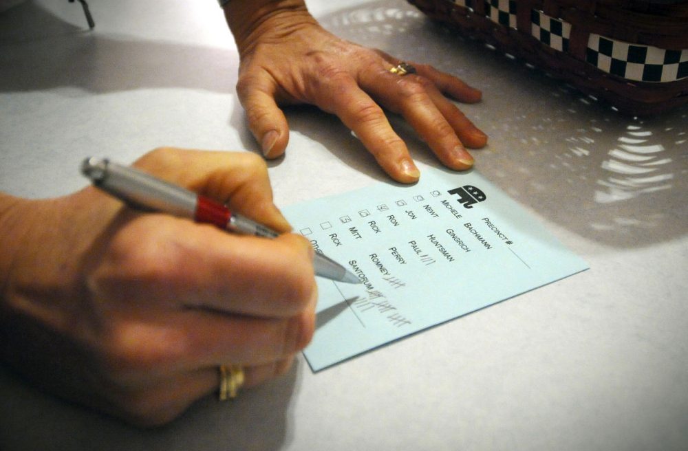 In this Jan. 3, 2012 photo, votes are tallied during a caucus of precinct 42 near Smithland, Iowa. More than 40 years ago, a scheduling quirk vaulted Iowa to the front of the presidential nominating process, and ever since most White House hopefuls have devoted enormous time and money to a state that otherwise would get little attention. (Dave Weaver/AP)