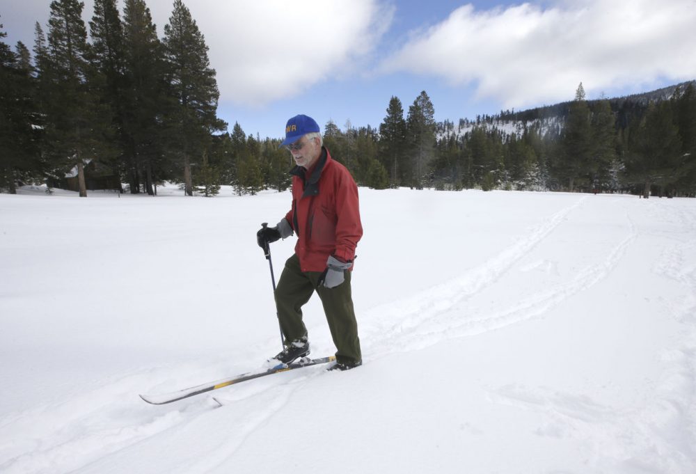 Frank Gehrke, chief of the California Cooperative Snow Surveys Program for the Department of Water Resources, leaves the snow covered meadow where he performed the first manual snow survey of the season at Phillips Station near Echo Summit, Calif., Wednesday, Dec. 30, 2015. The survey showed the snowpack to be nearly 5 feet deep, with a water content of 16.3 inches, which is 136 percent of normal for this site at this time of year. Rich Pedroncelli/AP)
