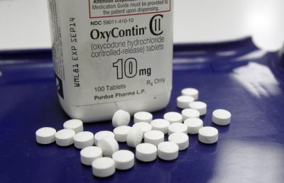Opioids include drugs like OxyContin, which are arranged in this 2013 file photo at a pharmacy. (Toby Talbot/AP)