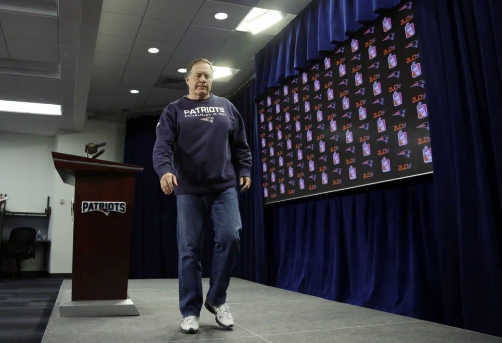 New England Patriots head coach Bill Belichick leaves the podium Monday, following his team's 20-18 AFC Championship game loss to the Broncos Sunday night. (Elise Amendola/AP)