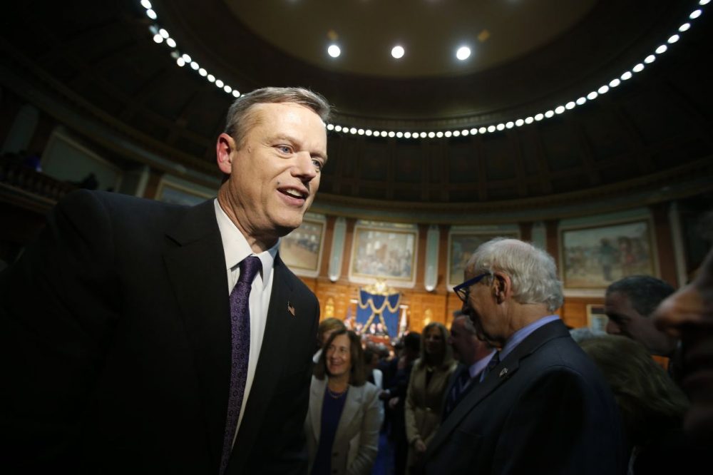 Gov. Baker's budget proposal reflects the ongoing reality that fixed costs required for MassHealth, pensions, debt service and other expenses continue to consume large chunks of new revenue. Here, Gov. Baker leaves the House chamber after delivering his State of the Commonwealth address on Jan. 21. (Michael Dwyer/AP)