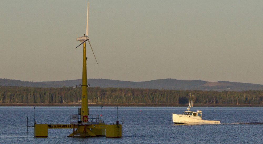 Fred Hewett: &quot;The compelling logic of offshore wind makes you wonder what took us so long to catch on.&quot; Pictured: A lobster boat passes the country's first floating wind turbine off the coast of Castine, Maine, which has been generating power since the summer of 2013. (Robert F. Bukaty/AP)