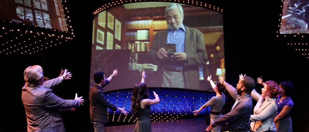 The cast of the Lyric Stage Company of Boston salutes the onscreen titular hero of &quot;Sondheim on Sondheim.&quot; (Courtesy Mark S. Howard/Lyric Stage Company of Boston)