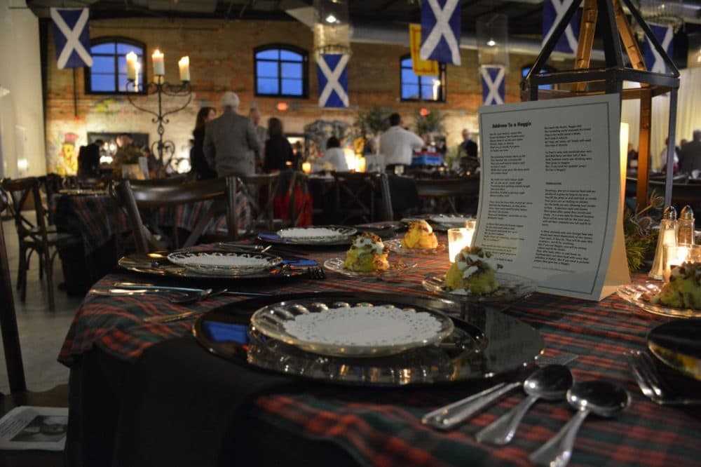 A table ready and set for a night of food and drink in celebration of Robert Burns. (Sam Whitehead/GPB News)