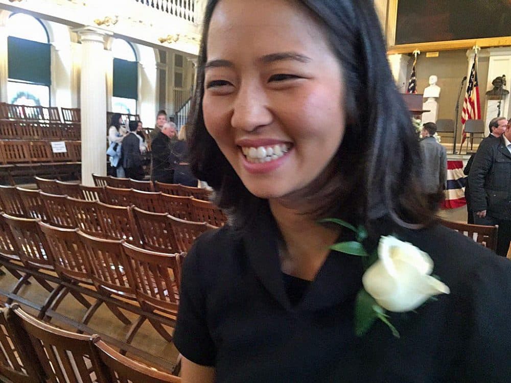 Newly-elected Boston City Council President Michelle Wu leaves Faneuil Hall after Monday's swearing-in ceremony. (Delores Handy/WBUR)