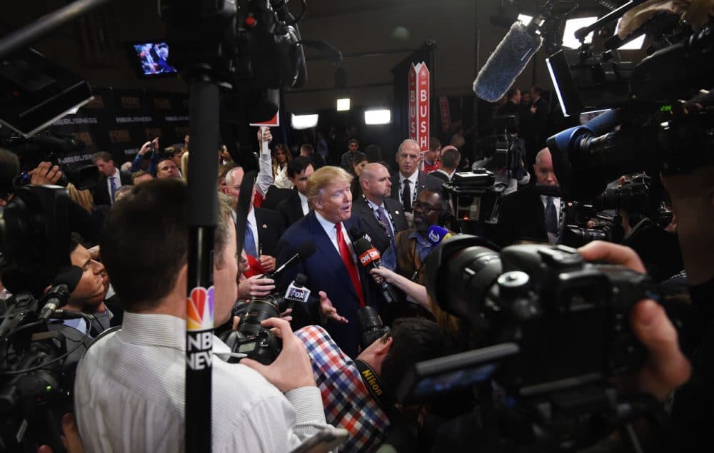Republican presidential candidate, businessman Donald Trump speaks in the spin room after the Fox Business Network Republican presidential debate at the North Charleston Coliseum, Thursday, Jan. 14, 2016, in North Charleston, S.C. (AP Photo/Rainier Ehrhardt)