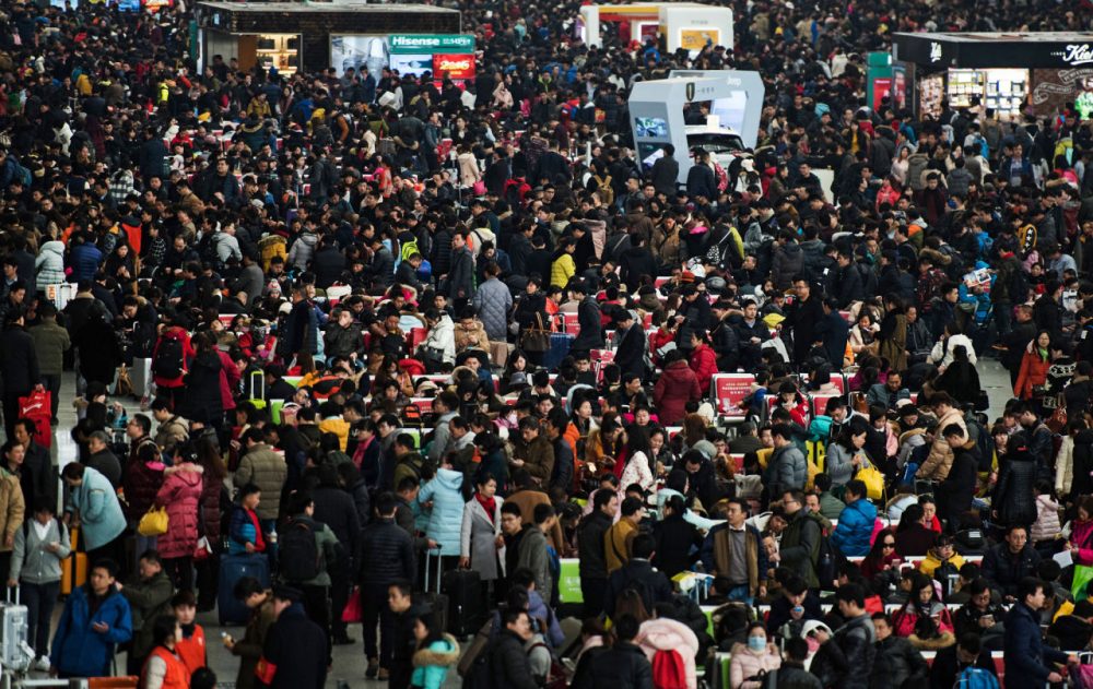Passengers crowd the Shanghai Hongqiao railway station as they wait to board their trains to head to their hometowns for the Lunar New Year holiday, in Shanghai on February 3, 2016. Over 2.9 billion trips will be made around China during the 40-day &quot;Spring Festival&quot; travel rush, which kicked off on January 24, Chinese authorities estimated.  The Spring Festival, this year being the Year of the Monkey, China's most important holiday centering around family reunions, will fall on February 8.    (Johannes Eisele/AFP/Getty Images)