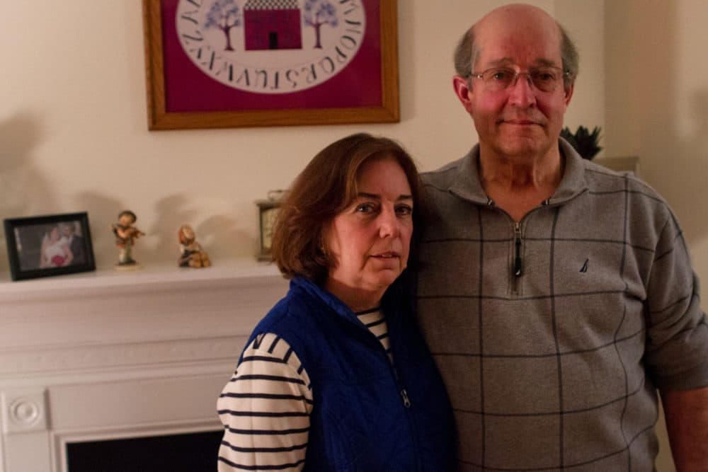 Chuck and Katherine Stuart are one of the only households in their Meredith, New Hampshire, neighborhood that have a Bernie Sanders sign in the front yard. (Hadley Green for WBUR)