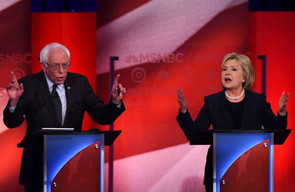 U.S. Democratic presidential candidates Bernie Sanders and Hillary Clinton participate in the MSNBC Democratic Candidates Debate at the University of New Hampshire in Durham on February 4, 2016. 
(Jewel Samad/AFP/Getty Images)