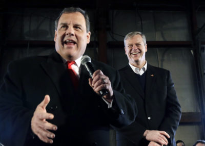 Gov. Christie, left, speaks as Baker laughs at a campaign event on Saturday. (Elise Amendola/AP)