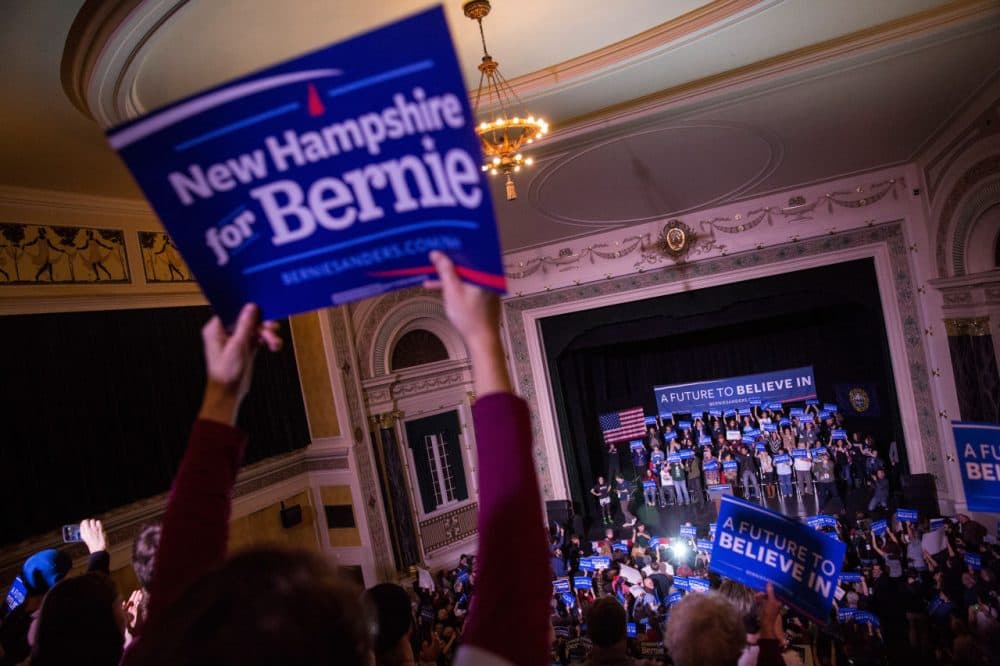 Audience members cheer for Democratic Presidential candidate Sen. Bernie Sanders at a rally in Keene, New Hampshire on Feb. 2, 2016. (Andrew Burton/Getty Images)