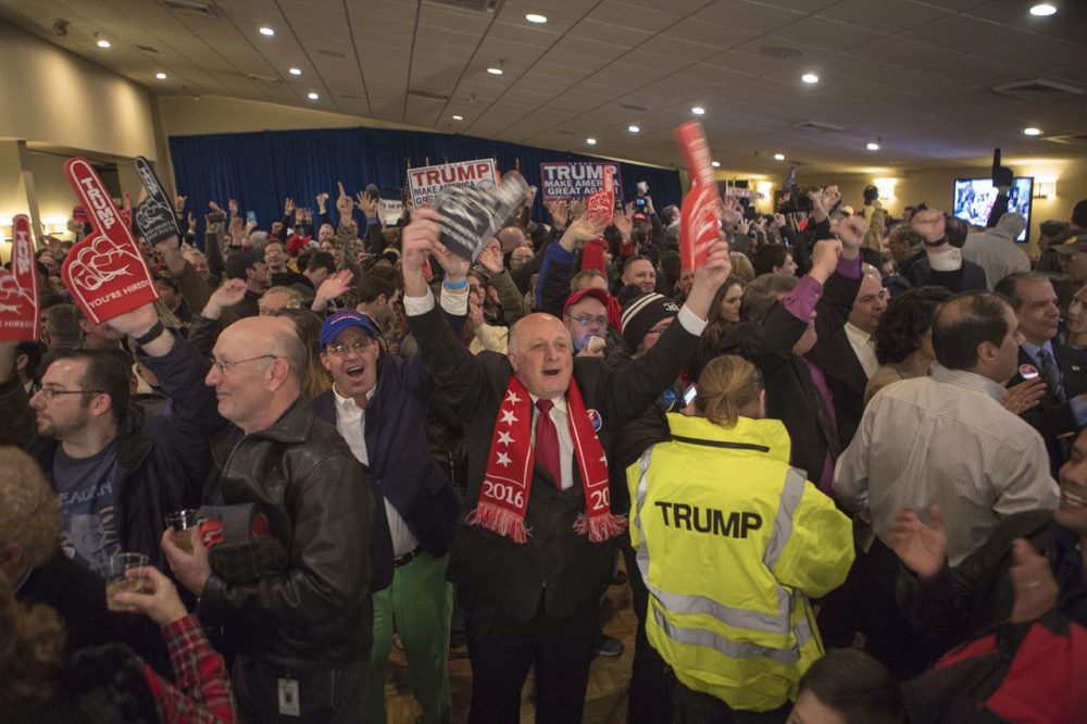 The crowd erupted as CNN called the New Hampshire Republican primary for Donald Trump. (Jesse Costa/WBUR)