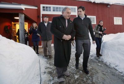Now a Republican presidential candidate, Marco Rubio, right, talks with Vahrij Manoukian, owner of Hollis Pharmacy &amp; General Store, following a stop where Rubio spoke to area residents on Feb. 23, 2015. (Jim Cole/AP)